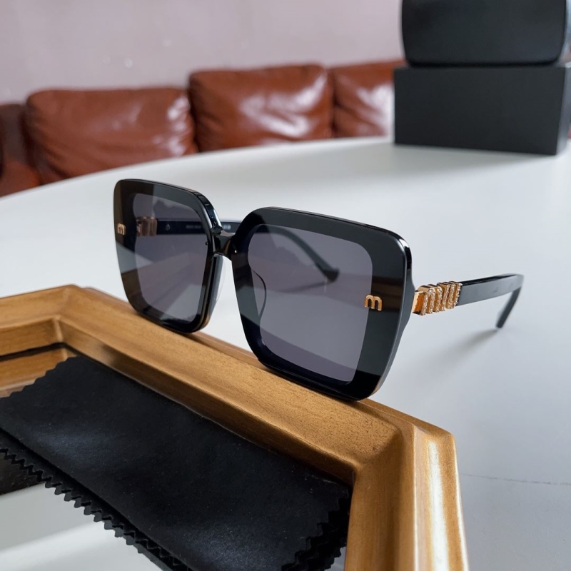 Miu miu Sunglasses